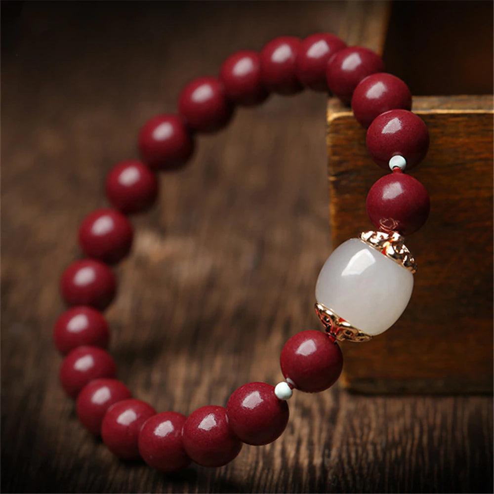 Bracelet Transformatif en Perles de Cinabre et Jade