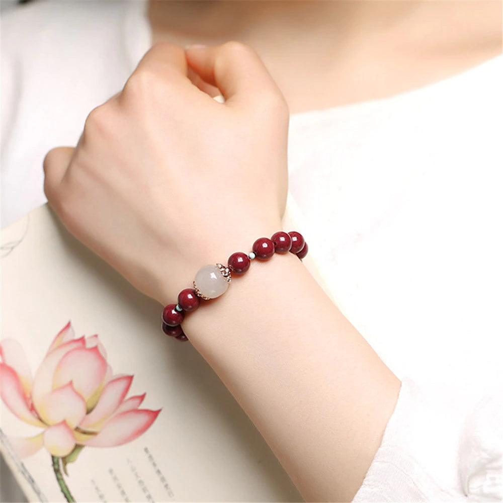 Bracelet Transformatif en Perles de Cinabre et Jade