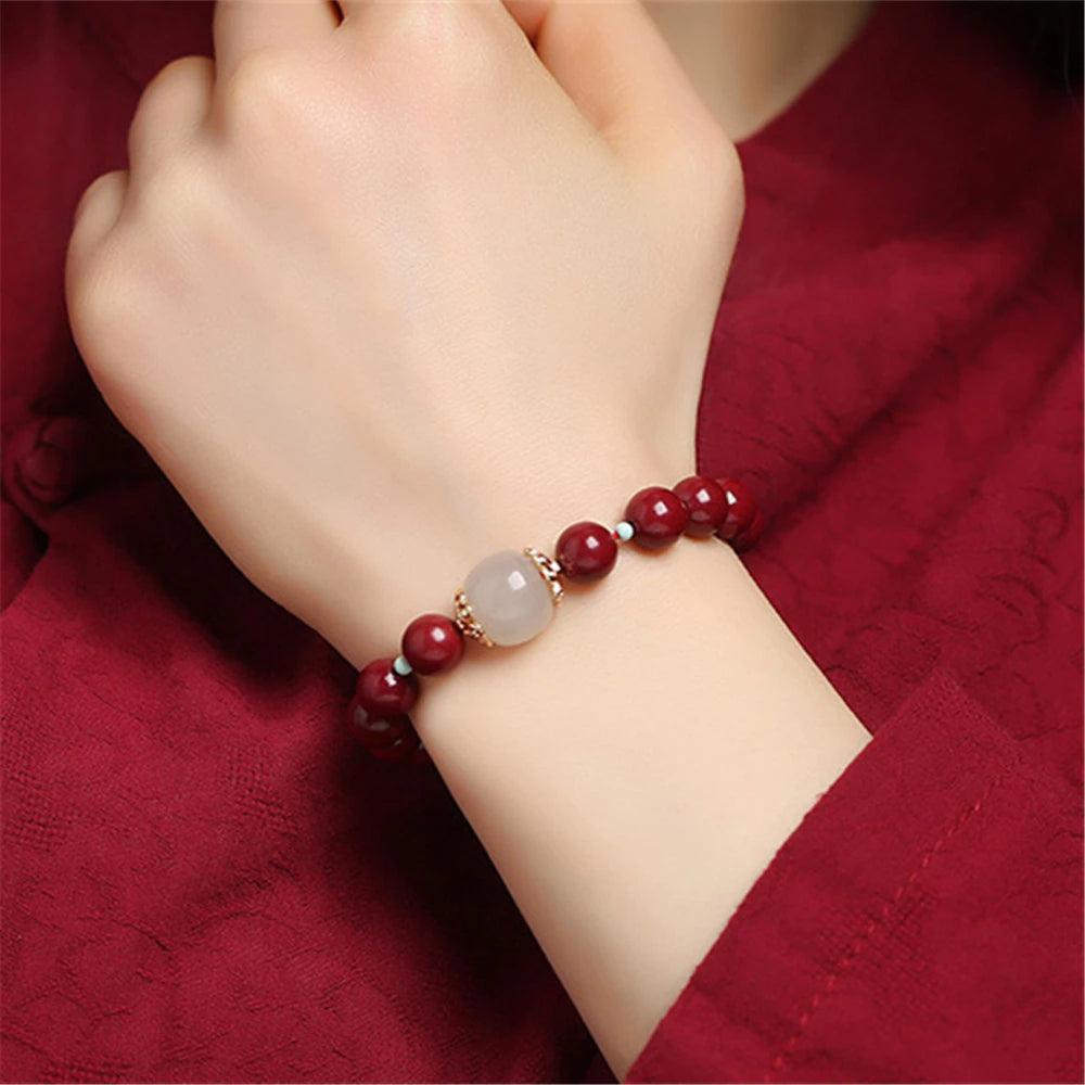 Bracelet Transformatif en Perles de Cinabre et Jade