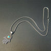 Collier Hamsa Abondance Paisible en Turquoise